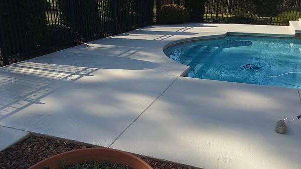 A portrait used for the Concrete Pool Deck project by the Concrete Pool Decks Daytona Beach team from Pavers Daytona Beach, a professional paver and concrete services in Daytona Beach, FL. Specializing in driveways, patios, pool decks, and more. Call for a free quote!
