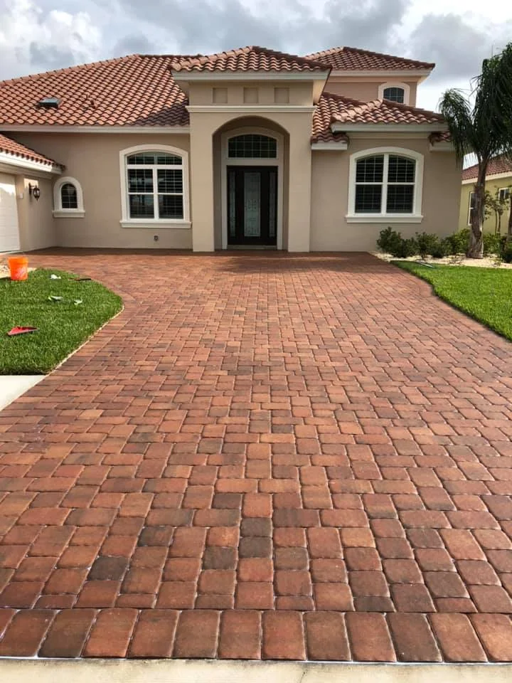 A portrait used for the Driveway project by Pavers Daytona Beach, a professional paver and concrete services in Daytona Beach, FL. Specializing in driveways, patios, pool decks, and more. Call for a free quote!