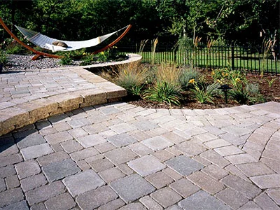 A portrait used for the Paver Installation project by Pavers Daytona Beach, a professional paver and concrete services in Daytona Beach, FL. Specializing in driveways, patios, pool decks, and more. Call for a free quote!