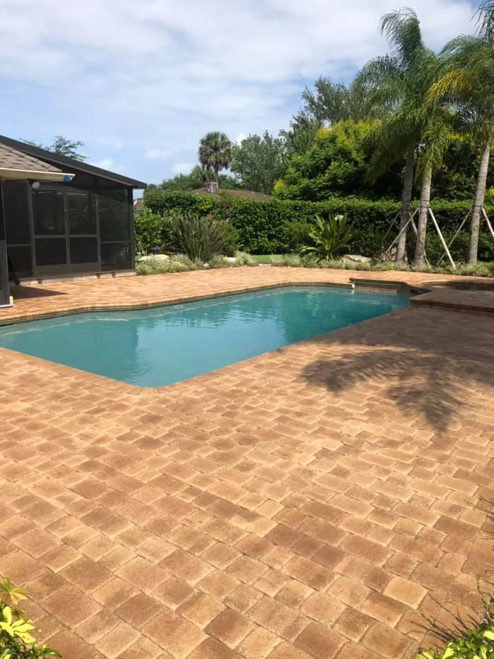 A portrait used for the Pool Deck project by the Pool Deck Pavers Daytona Beach team from Pavers Daytona Beach, a professional paver and concrete services in Daytona Beach, FL. Specializing in driveways, patios, pool decks, and more. Call for a free quote!
